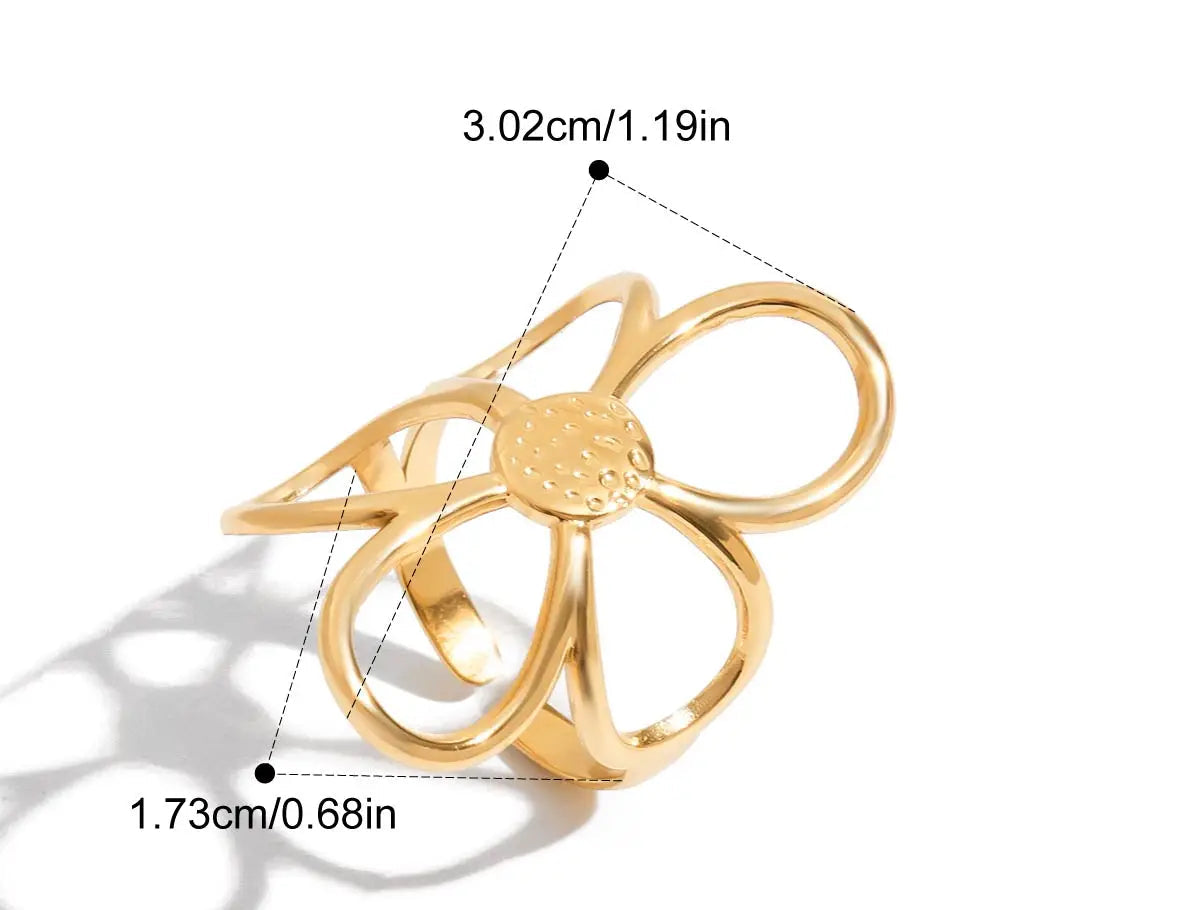Eine grafische Darstellung der goldenen Version des Rings mit dem Blumen-Design, die seine Maße von 1,73 cm und 0,86 cm angibt.