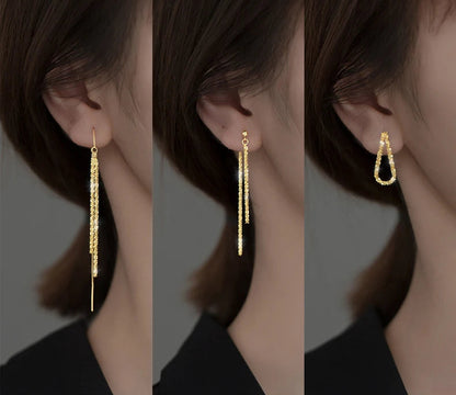 Collage von drei Ansichten, die zeigen, wie lange, goldfarbene Faden-Ohrringe und ein kurzer, U-förmiger goldfarbener Ohrring (vermutlich vergoldetes 925er Silber) am Ohr getragen werden.