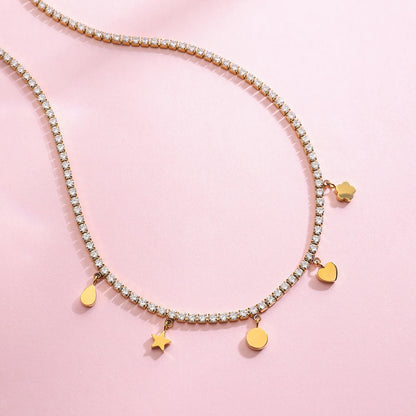 Damenkette mit Stern-, Herz- und Rundanhängern und Zirkoniasteinen | PVD 18K vergoldeter Edelstahl | glänzende kurze Halskette
