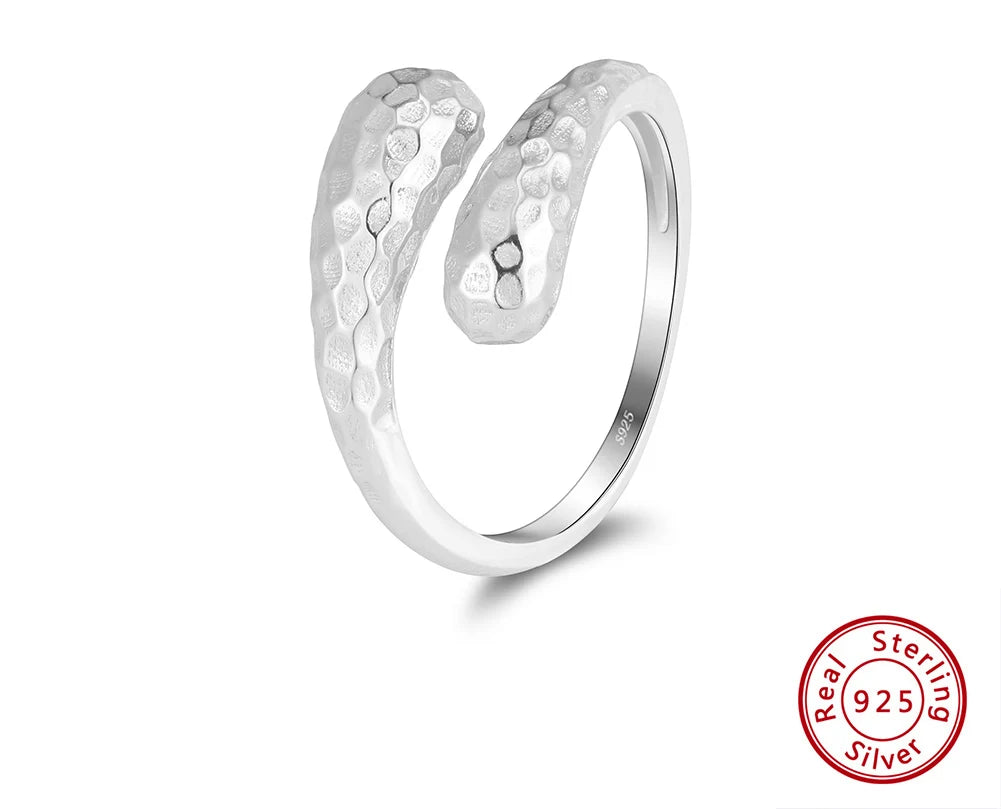 Silberner Schlangenring aus 925er Sterling Silber, glatt poliert, verstellbar. Unten rechts: Siegel "Real 925 Sterling Silver".