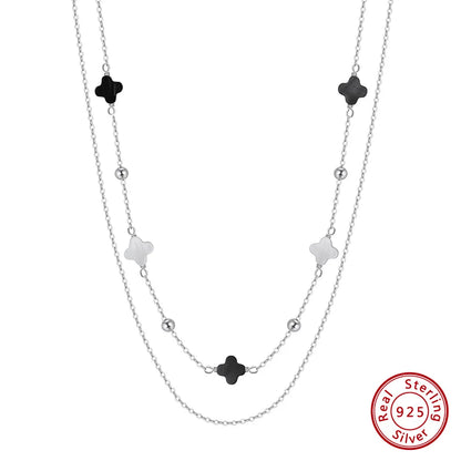 Doppelte Gliederkette aus 925er Sterling Silber mit beigen und schwarzen vierblättrigen Kleeblättern (Clover).