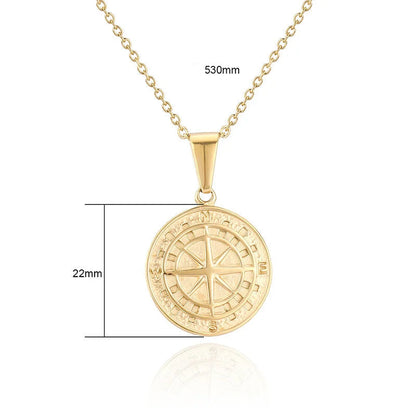 Technische Zeichnung eines goldfarbenen Kompass-Medaillons mit Maßen, das die gravierte Kompassrose detailliert zeigt.