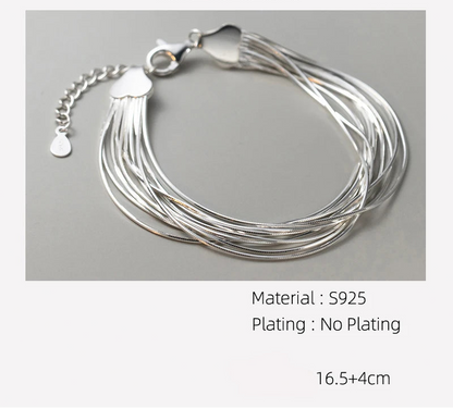 Materialangabe (S925, unplattiert) und Längenmaße (16,5+4 cm) für das voluminöse, mehrsträngige Silberarmband